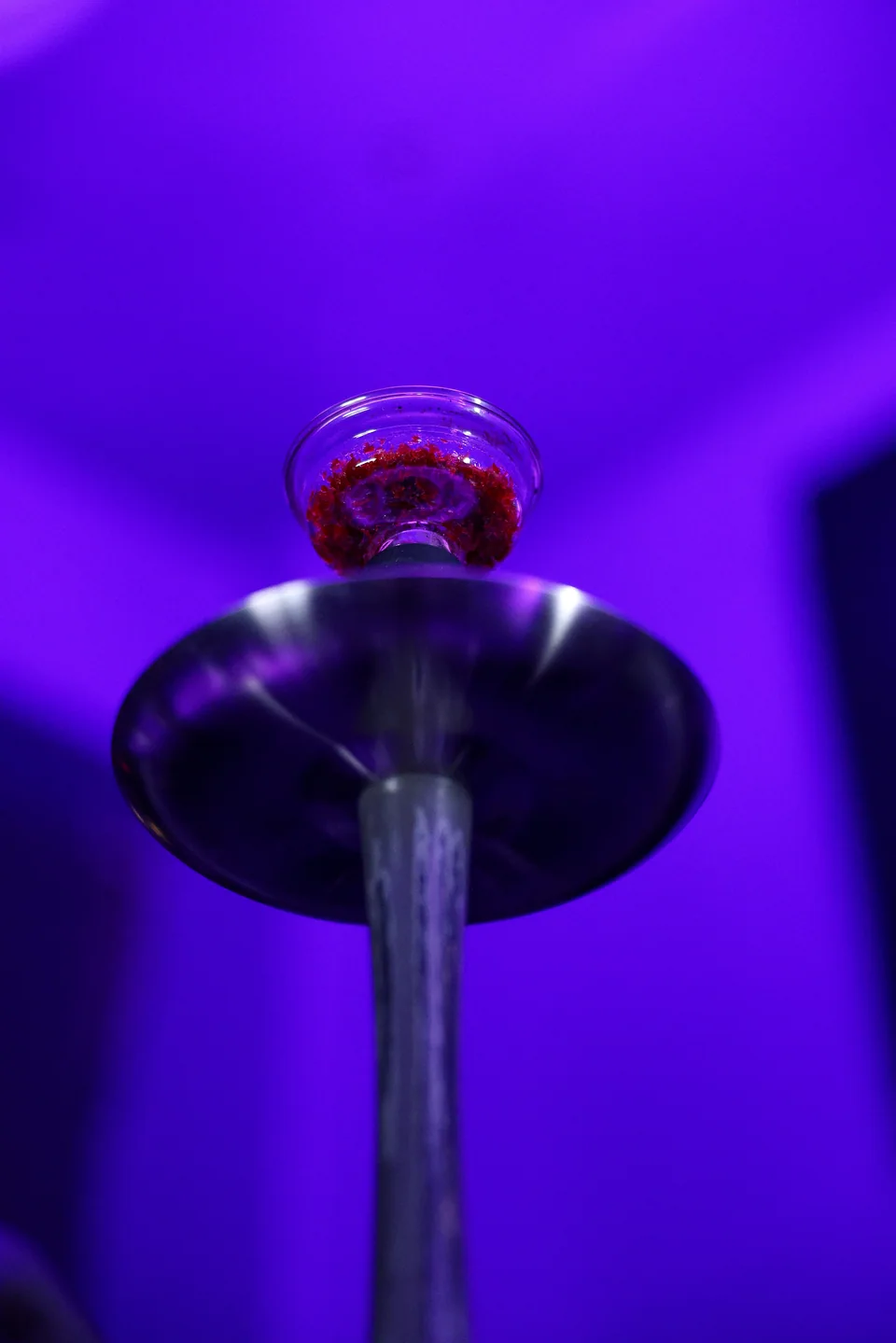 The underside of a hookah tray and bowl
